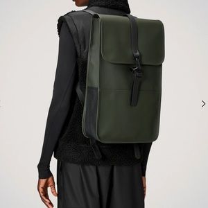 Rains green waterproof backpack